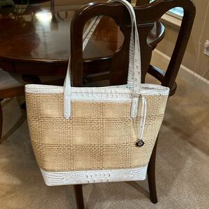 Brahmin woven straw with white/gold trim handbag.  Matching detachable pouch.